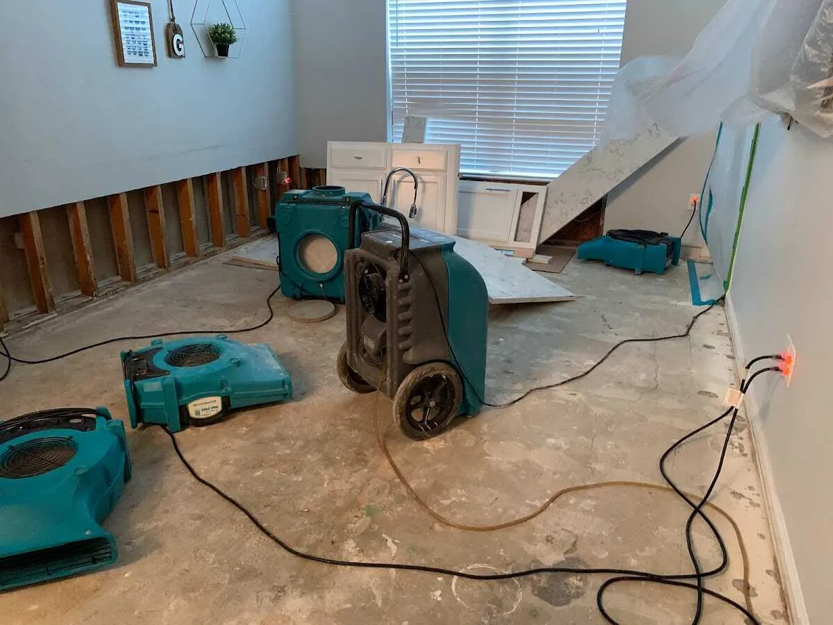 Dehumidifier in flood-cut room for Water Damage Restoration in Grandview